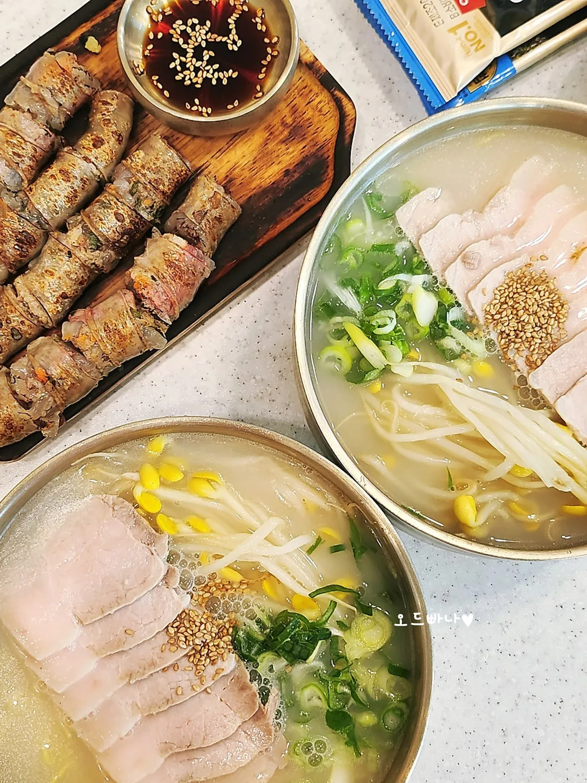 A bowl of rich bone-broth pork noodle soup