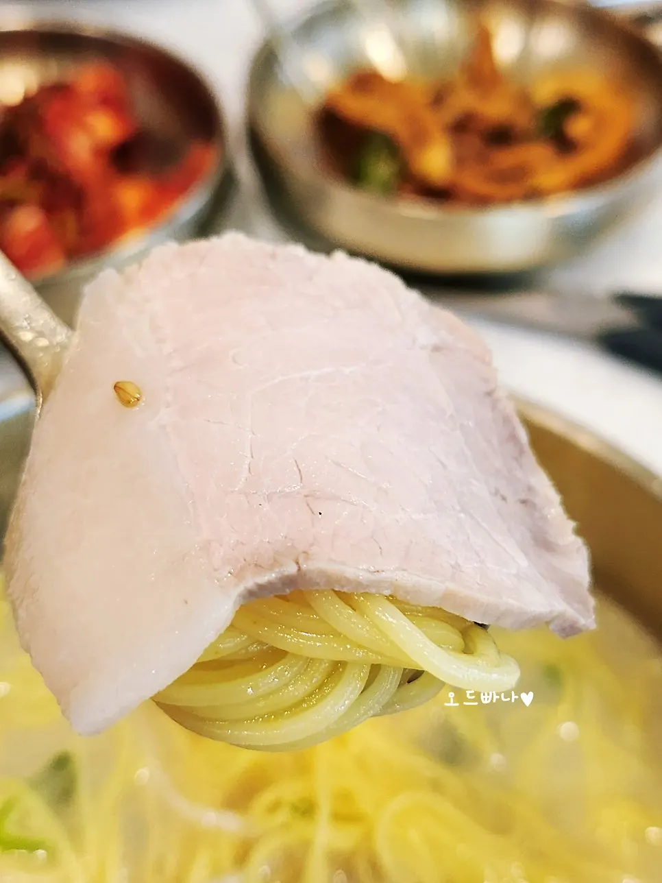 Portion of pork noodle soup and rice set aside for a child