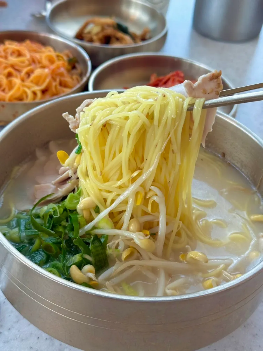 Dombe suyuk served sliced on a cutting board
