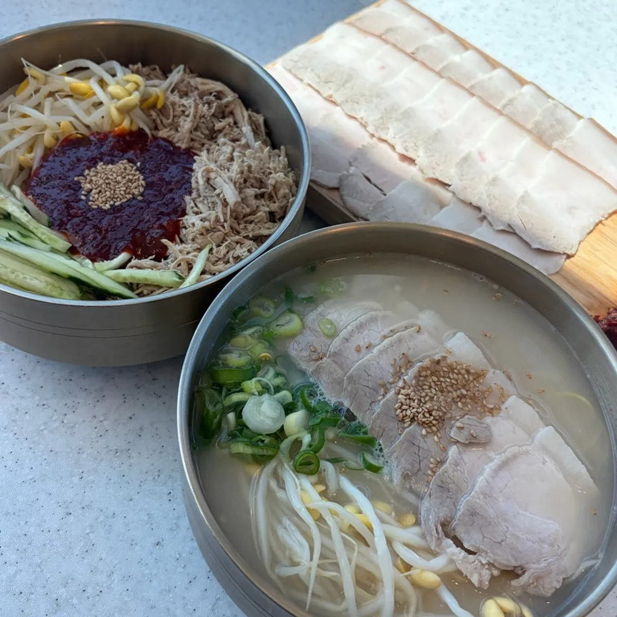 Signature pork noodle soup photo at Handam Guksu Gwakji Aewol Branch