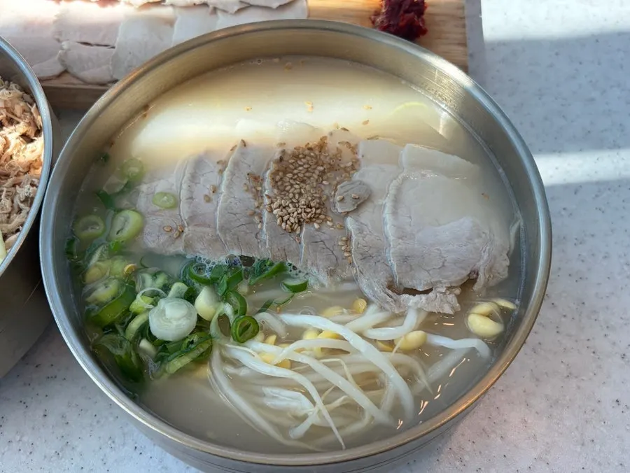 Close-up of the milky, rich bone-broth pork noodle soup