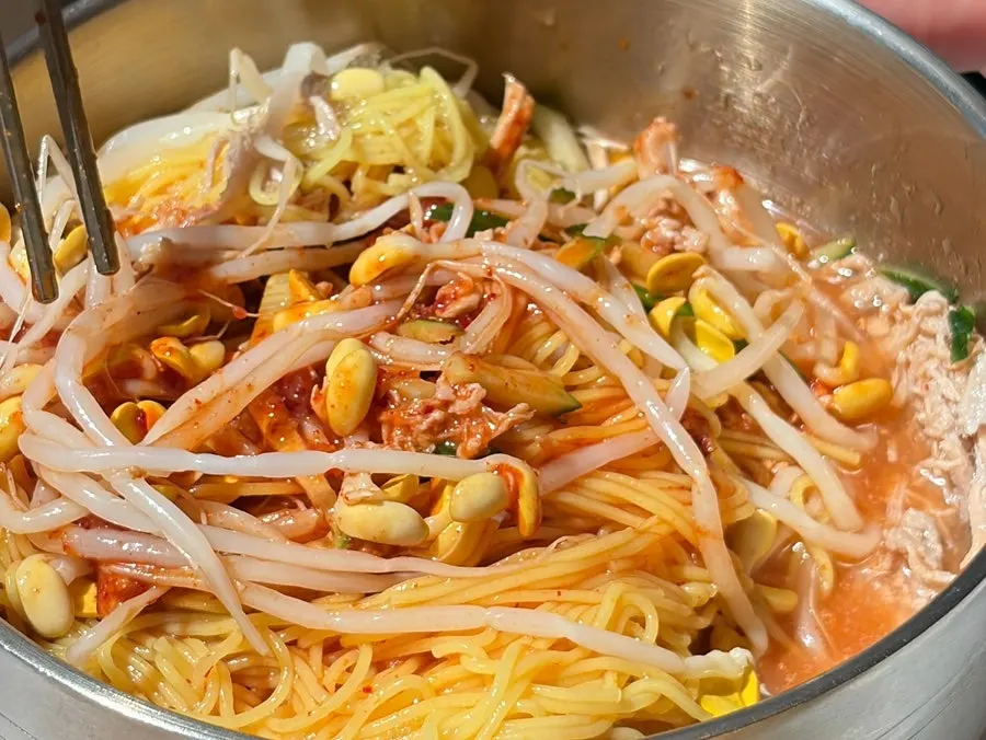 Bowl of bibim noodles full of bean sprouts