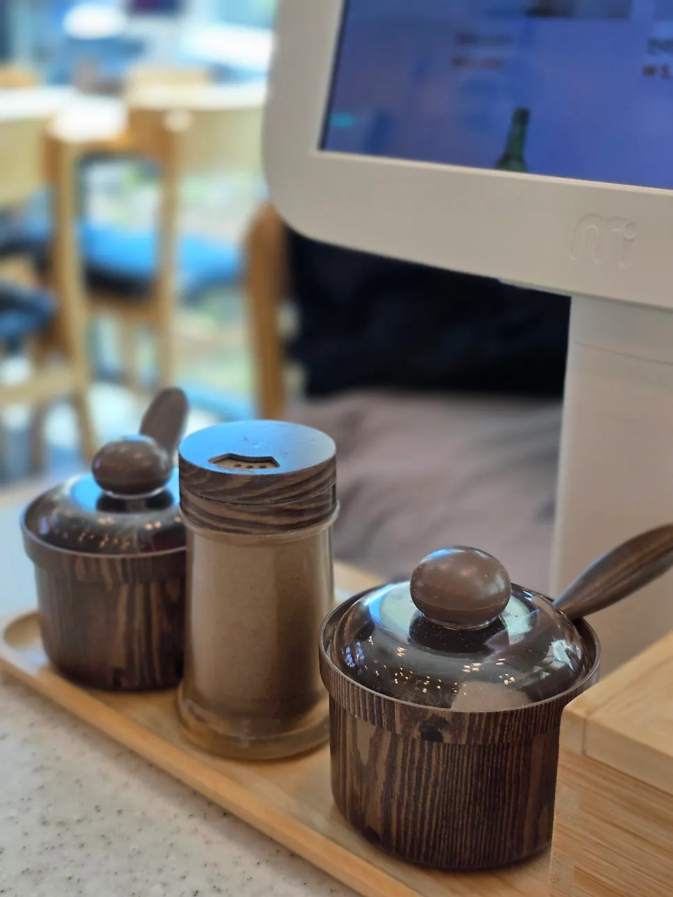 Bowls and utensils arranged at the self-serve bar