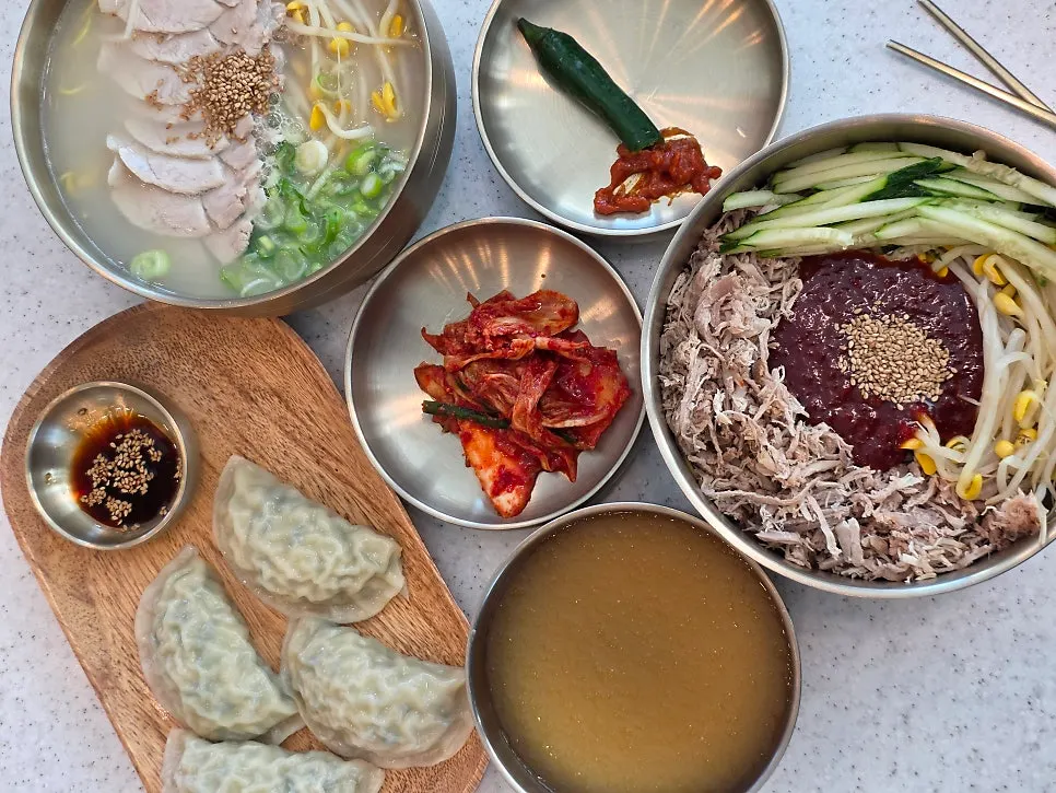 Table set with noodles and side dishes
