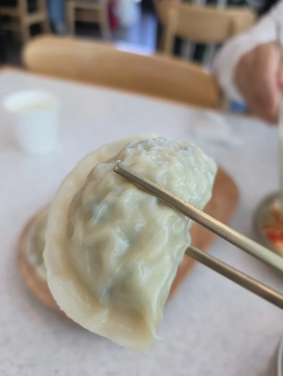 Cross-section of a pork mandu showing the full filling