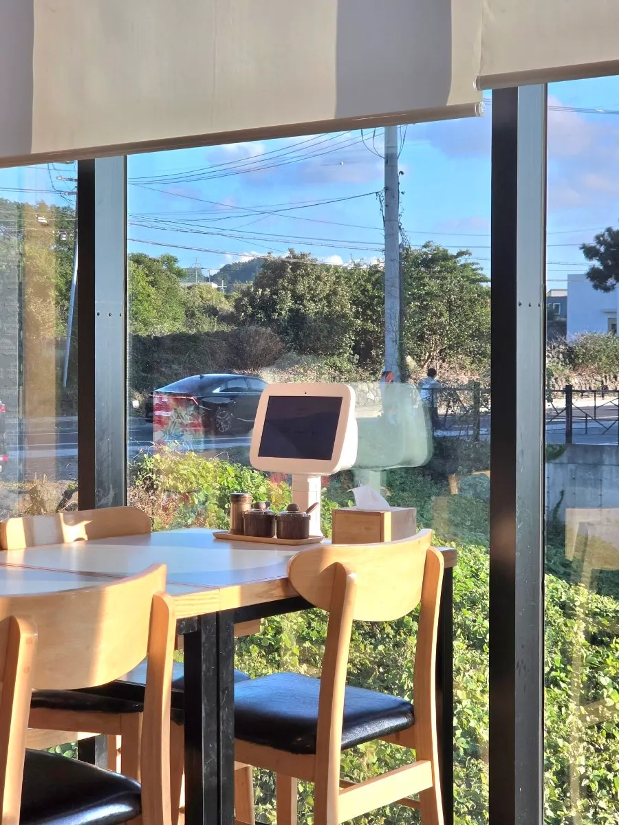Restaurant interior and ocean view in the evening