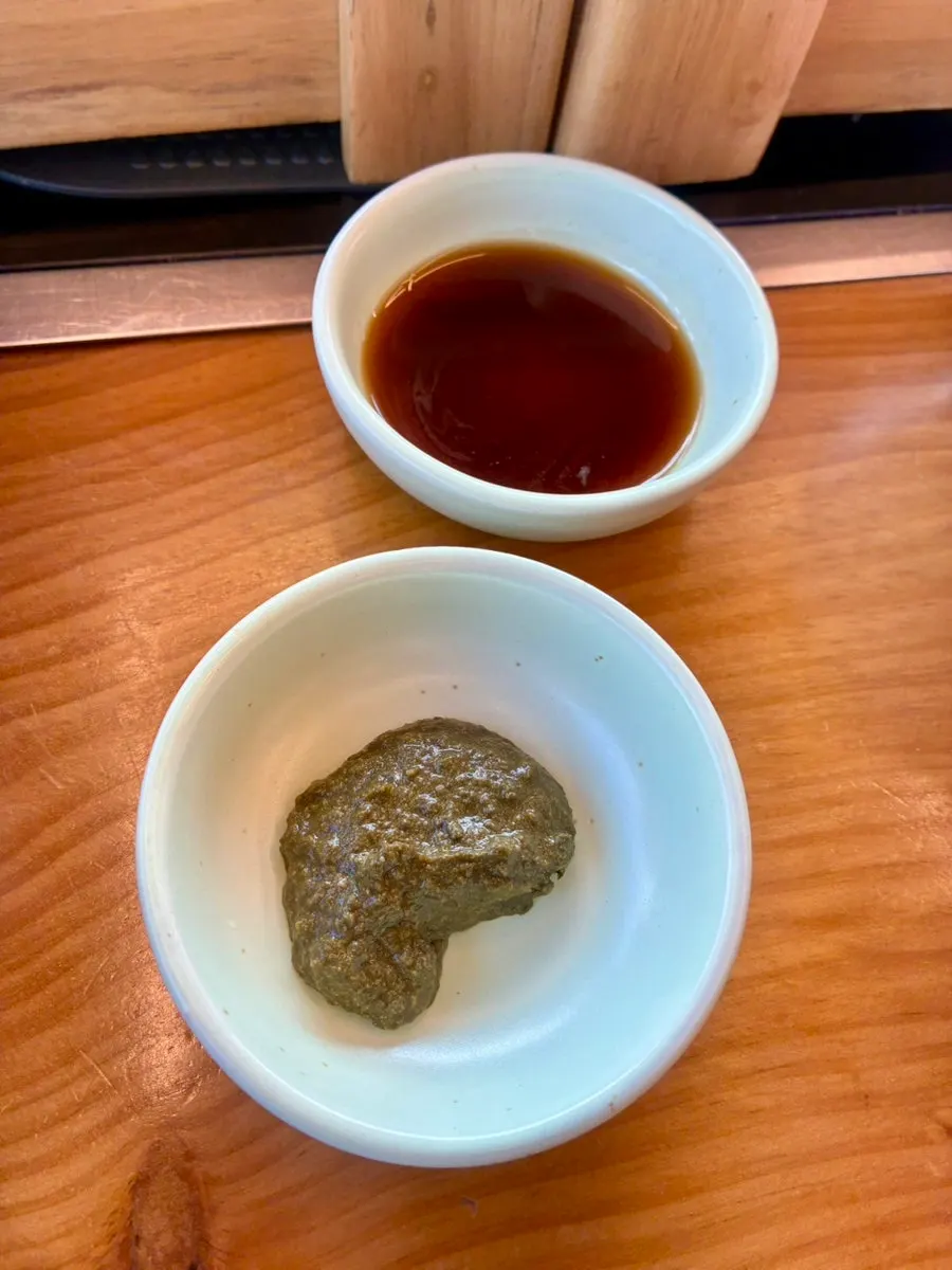 Solbap being scooped into a bowl