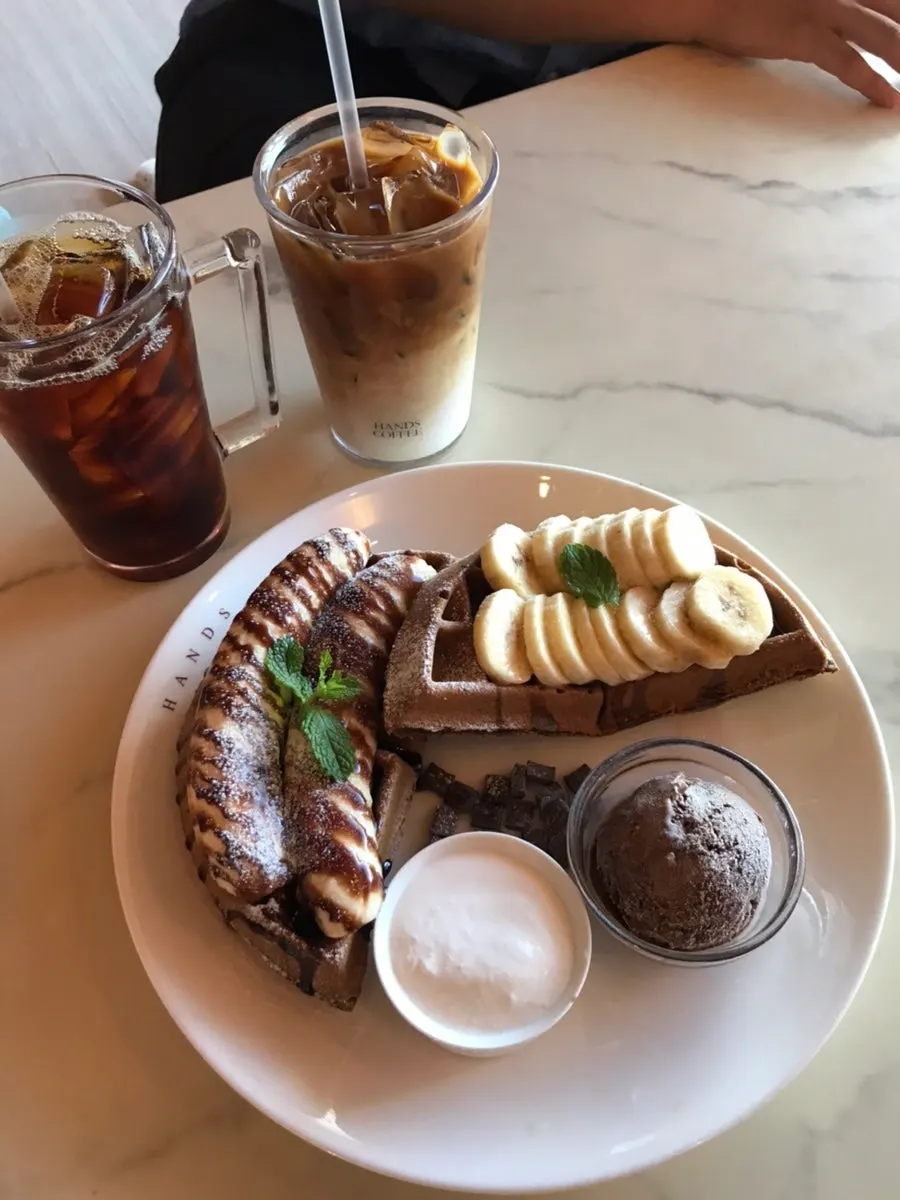 Chocolate banana waffle topped with ice cream