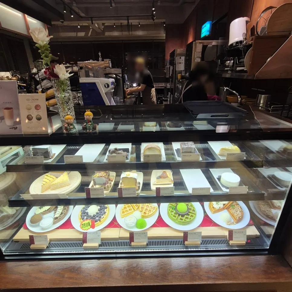 Dessert menu board listing waffles and cakes