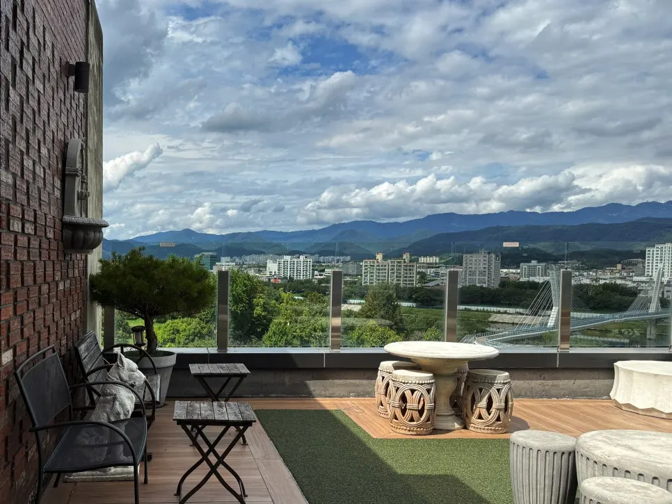 Outdoor terrace seating on the 4th floor of Hands Coffee