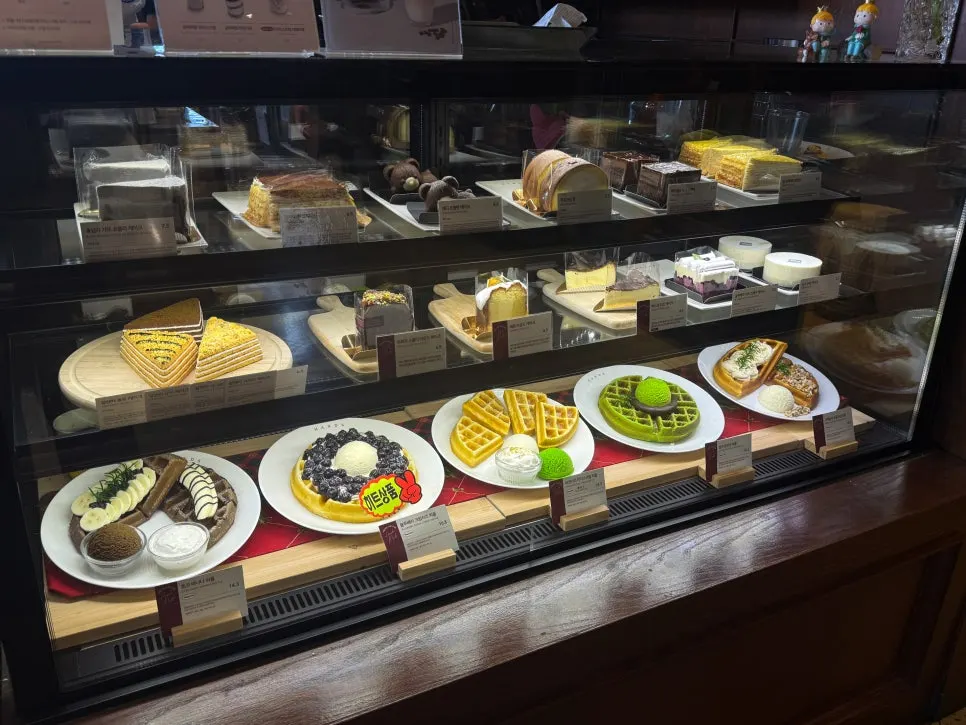 Menu board for waffles and desserts at Hands Coffee Dongchon Resort Branch