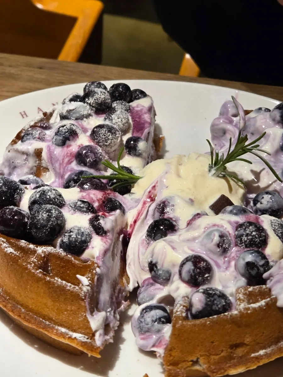Blueberries and vanilla ice cream on top of a glutinous rice waffle