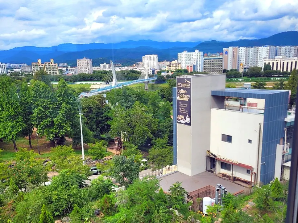 Forest view of Haemaji Bridge and the Kumho River through the floor-to-ceiling windows