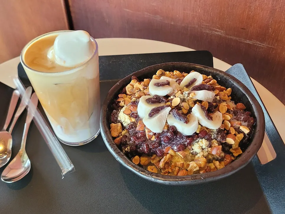 Ice cream latte served with a spoon