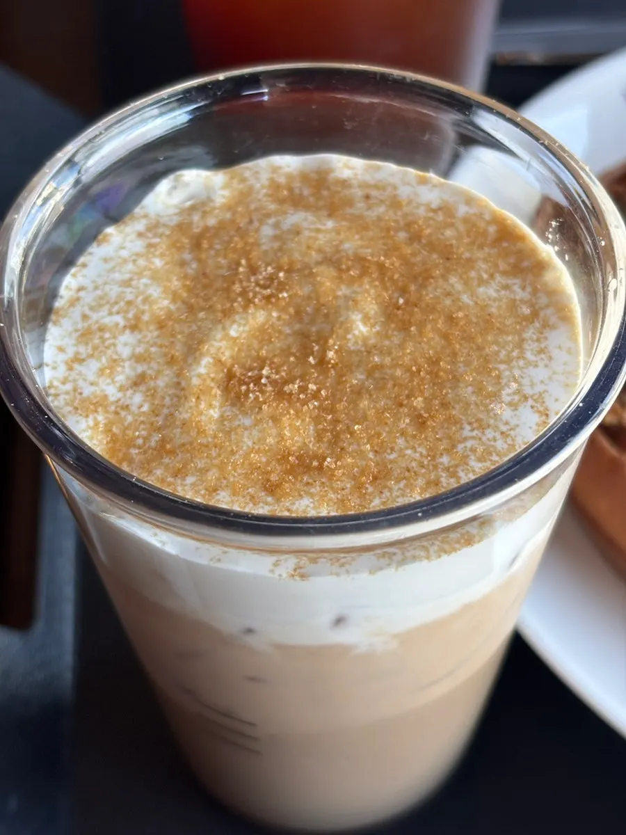 Iced vanilla brûlée latte topped with sugar coating