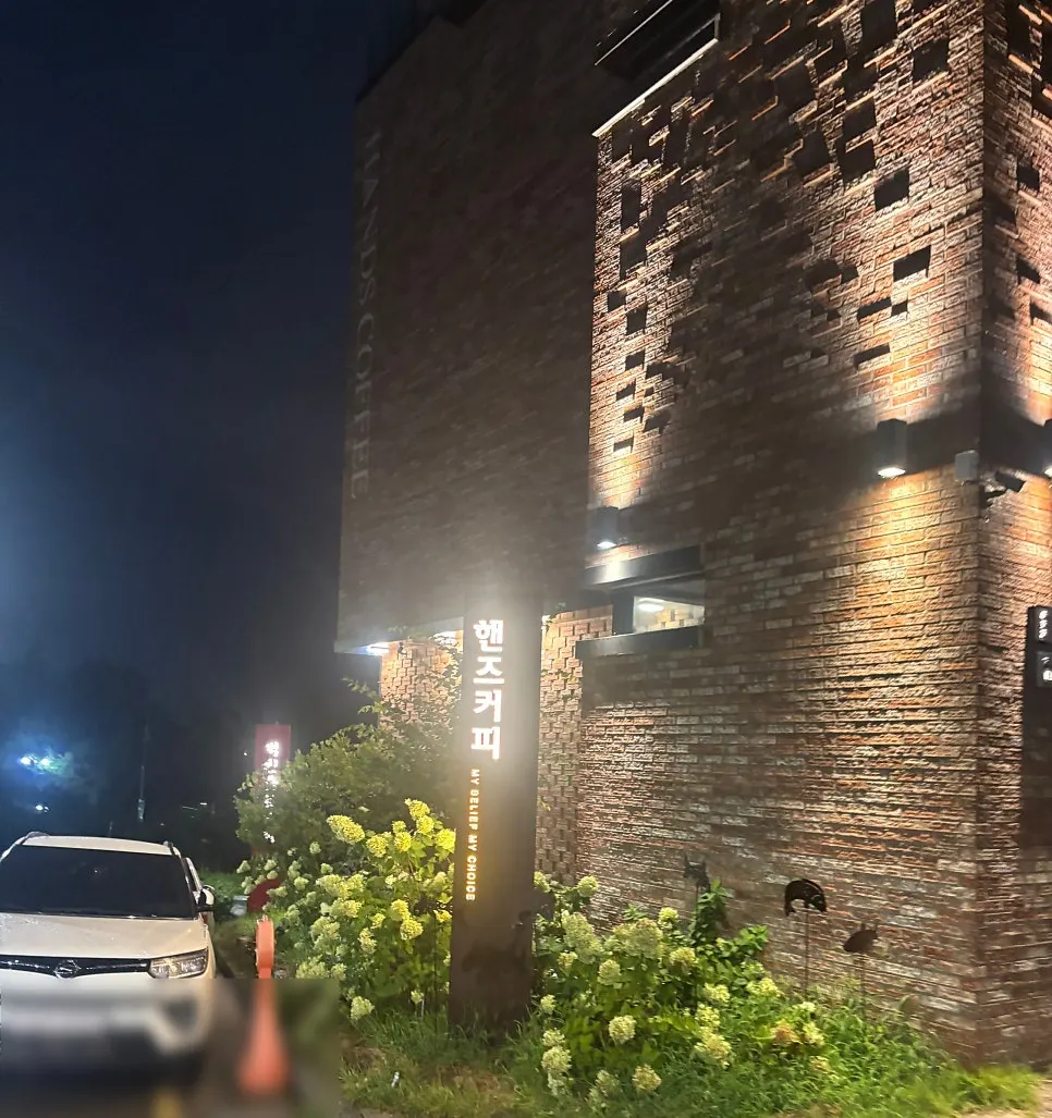 Night view of the lit-up Dongchon Resort café