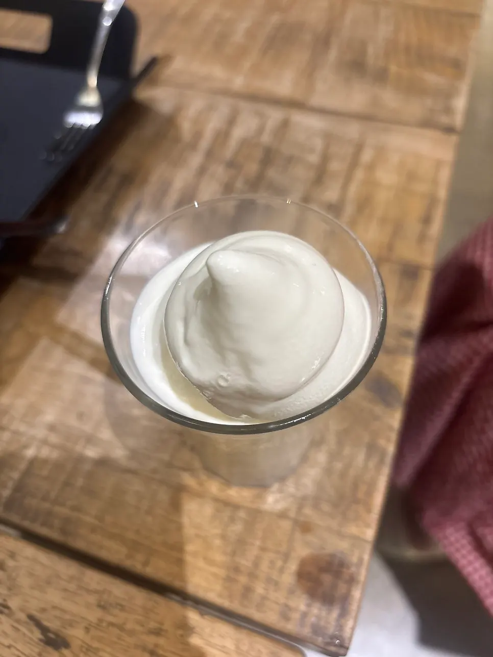 Soft serve ice cream in a glass cup