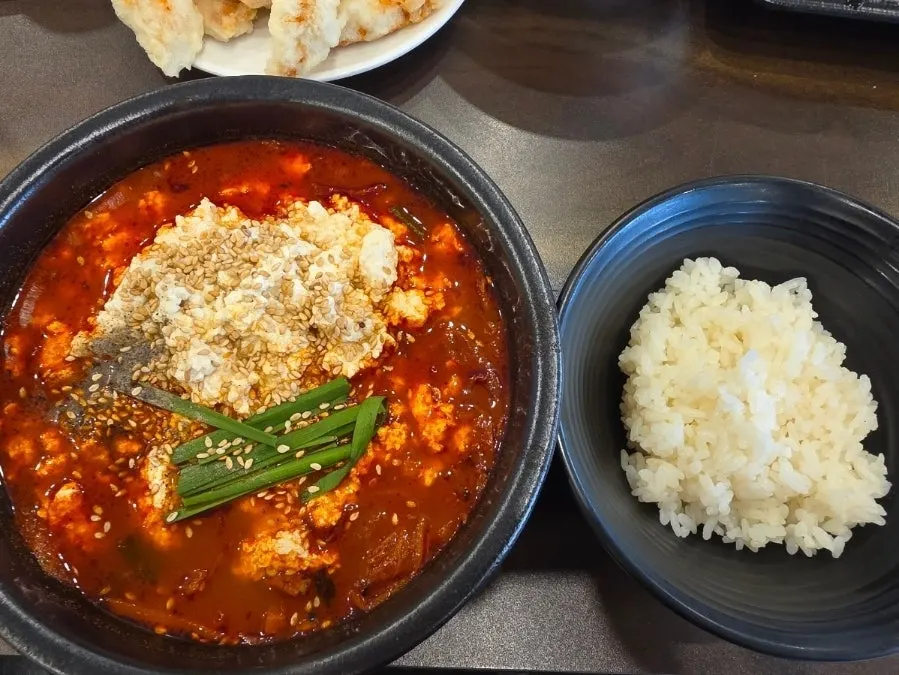 A Chinese meal spread including jjajangmyeon