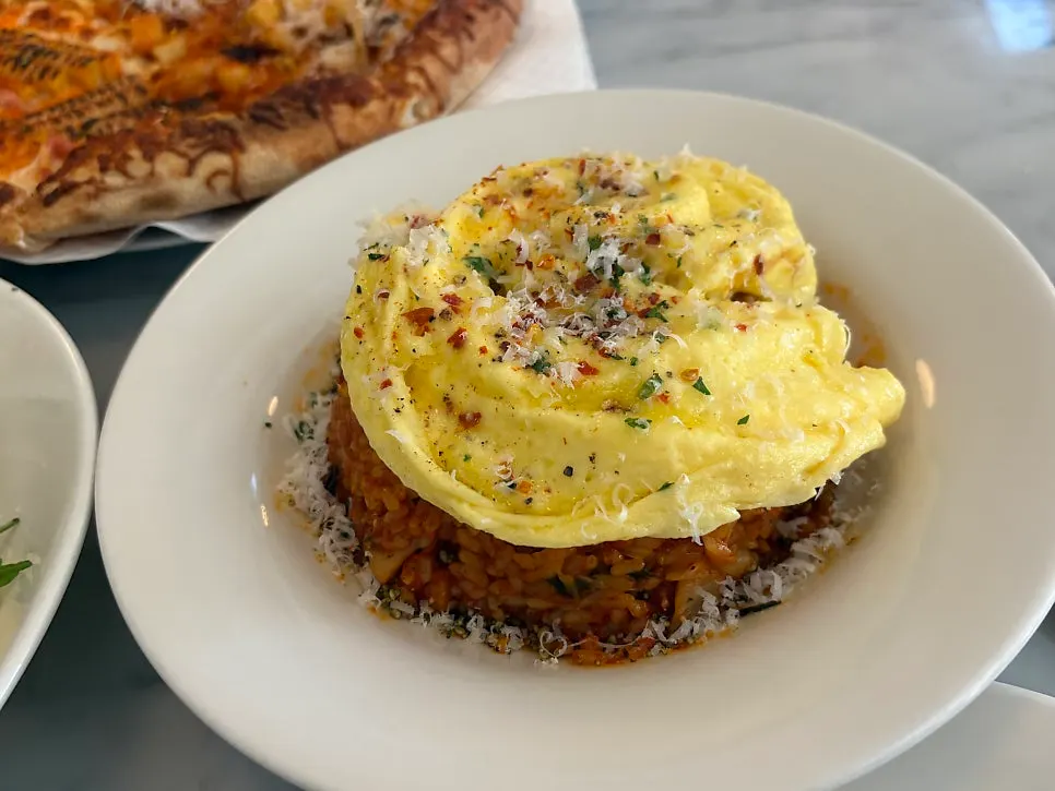 Kimchi fried rice topped with an omelet