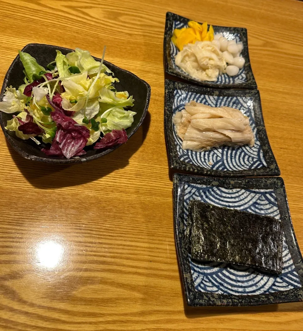 Table setting with small plates and a utensil holder