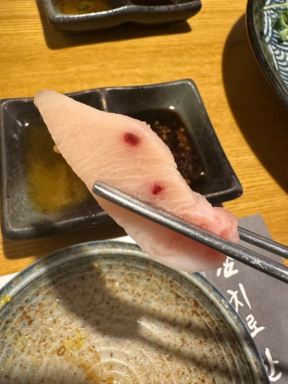 Tuna sashimi wrapped with aged kimchi and seaweed