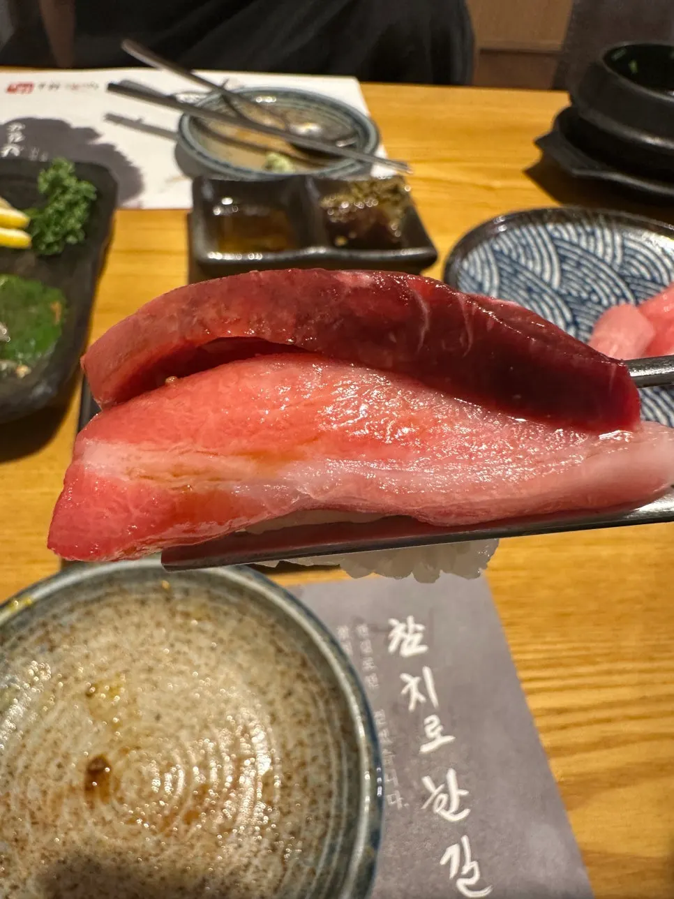 Refilled plate of pale swordfish belly