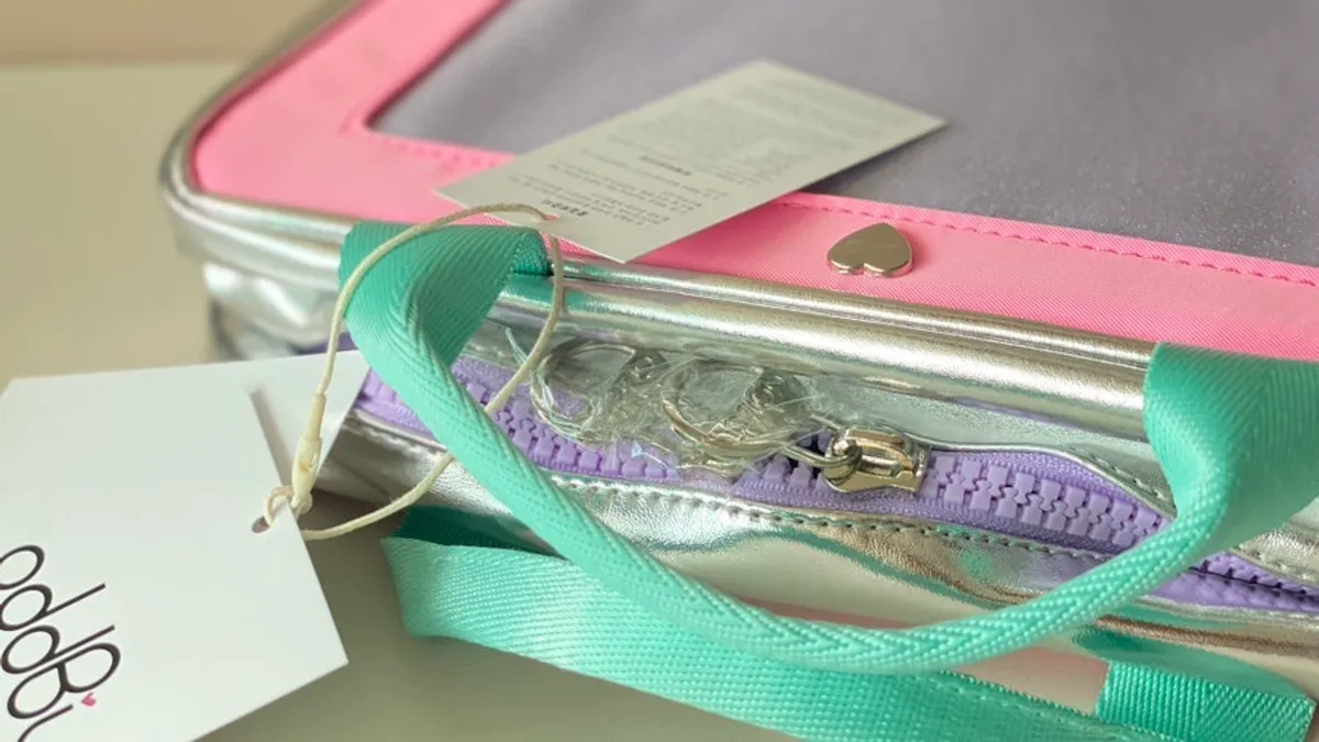 ODDBBI toiletry pouch in plastic packaging