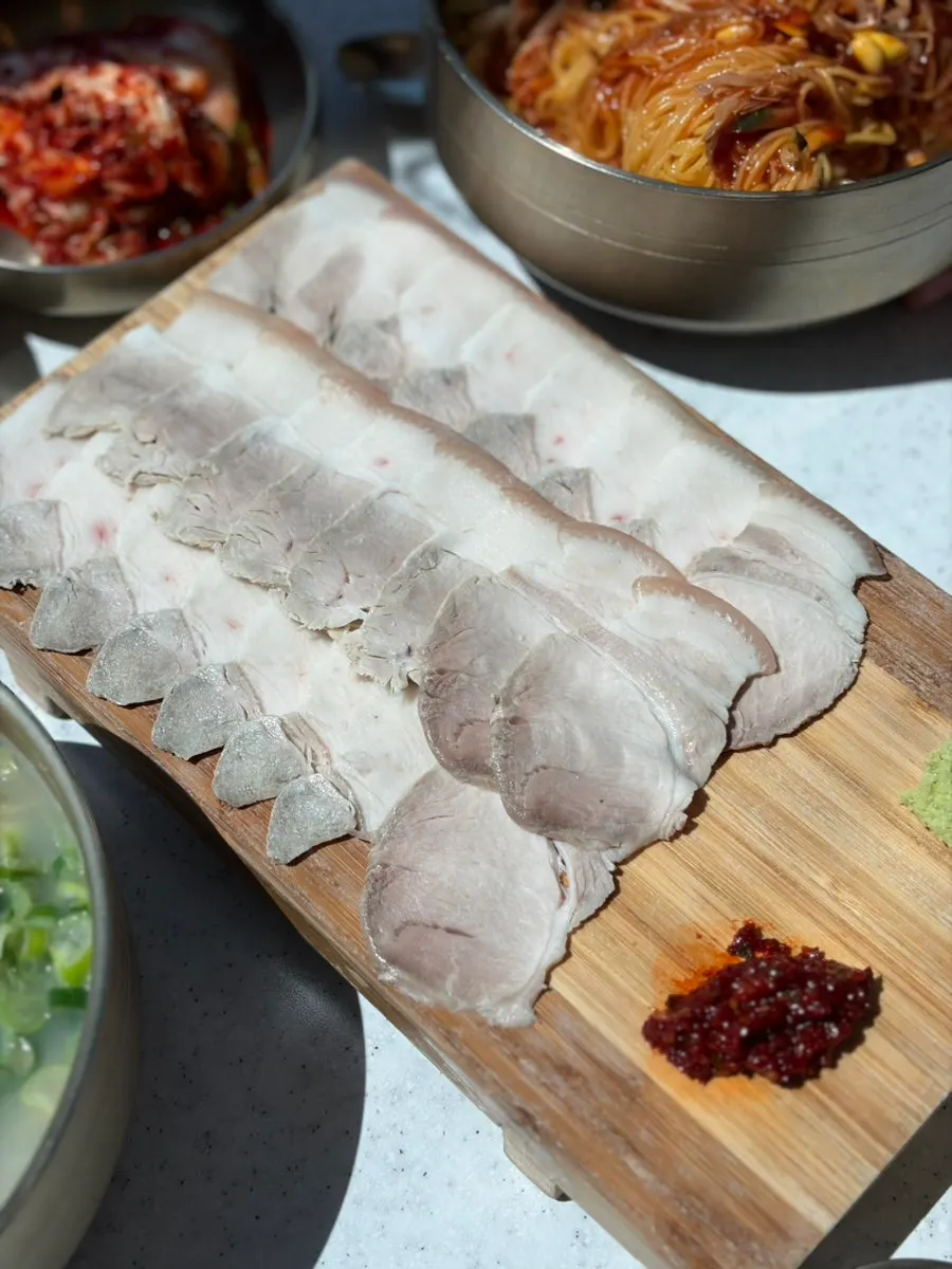 Two bowls of noodles and cold pork, all around ₩10,000