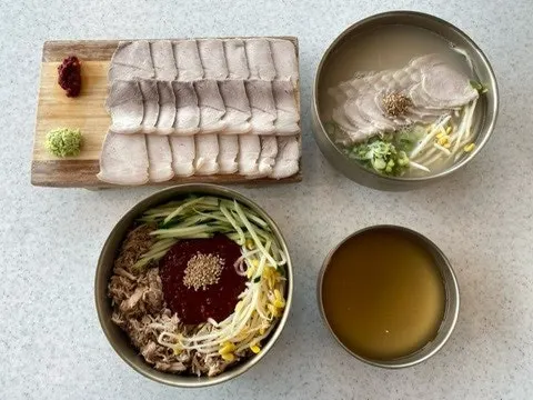 Self-serve bar with kimchi, pickled radish, and other side dishes