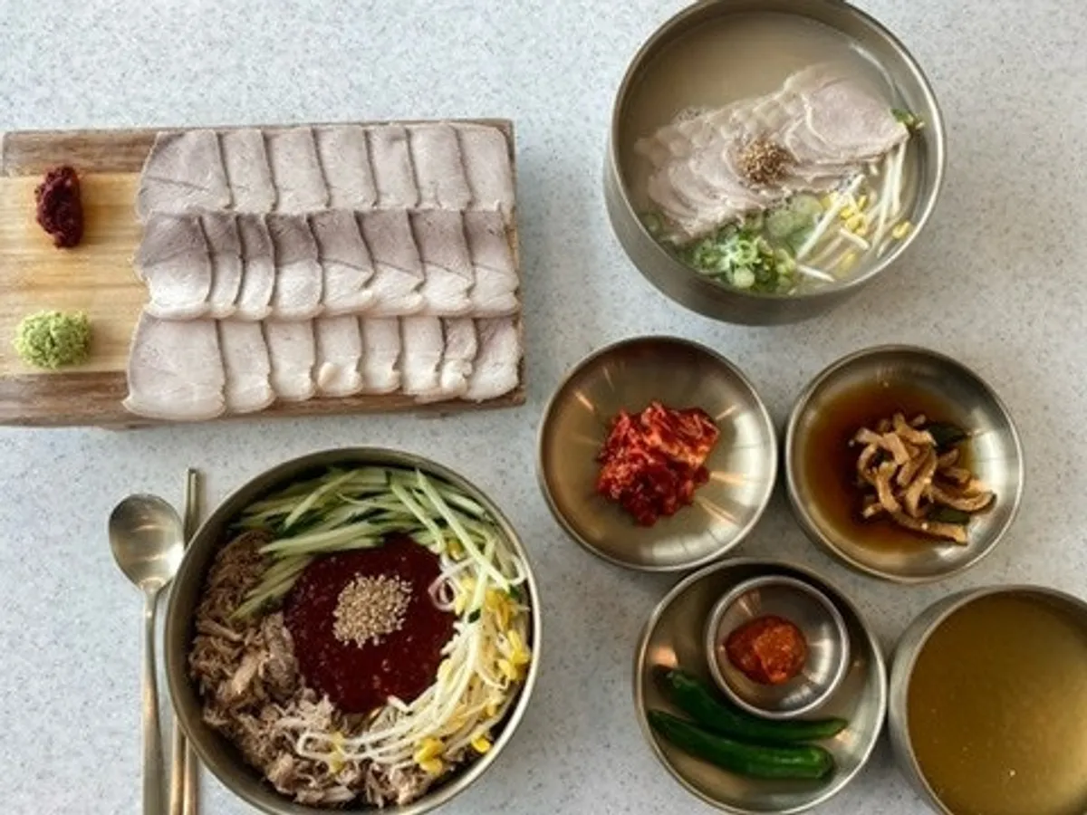 Noodle table setting with the Handam Beach ocean view in the background