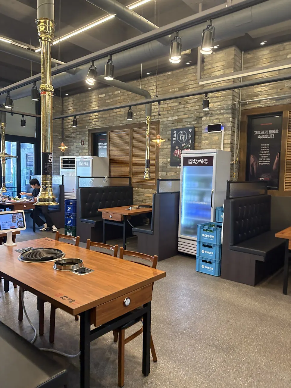 Spacious restaurant interior with partitioned tables