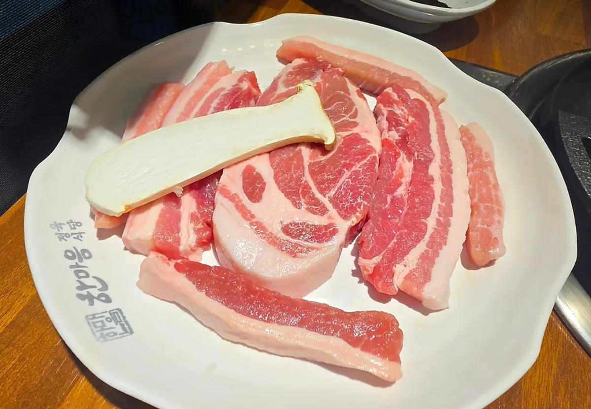 A plate with five cuts from the pork half pig set