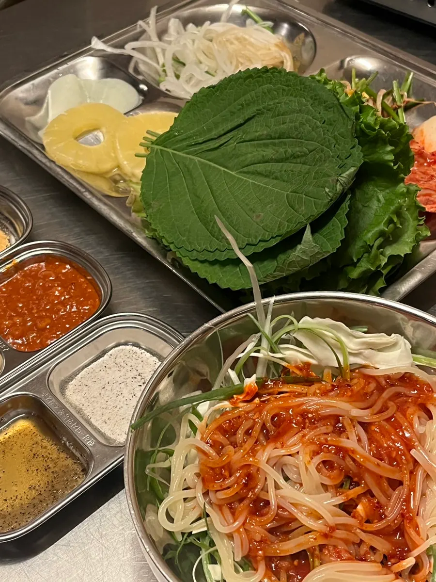 Table setting with basic side dishes and doenjang jjigae