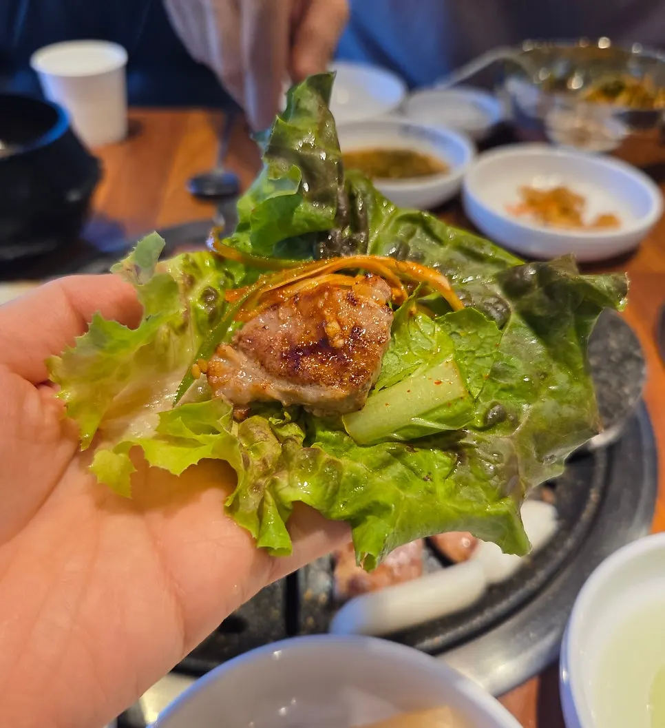 A grilled piece of meat ready to be wrapped