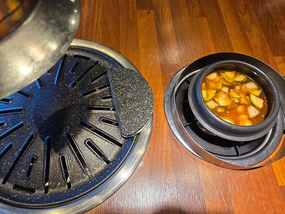 All-you-can-eat doenjang jjigae simmering on its own burner