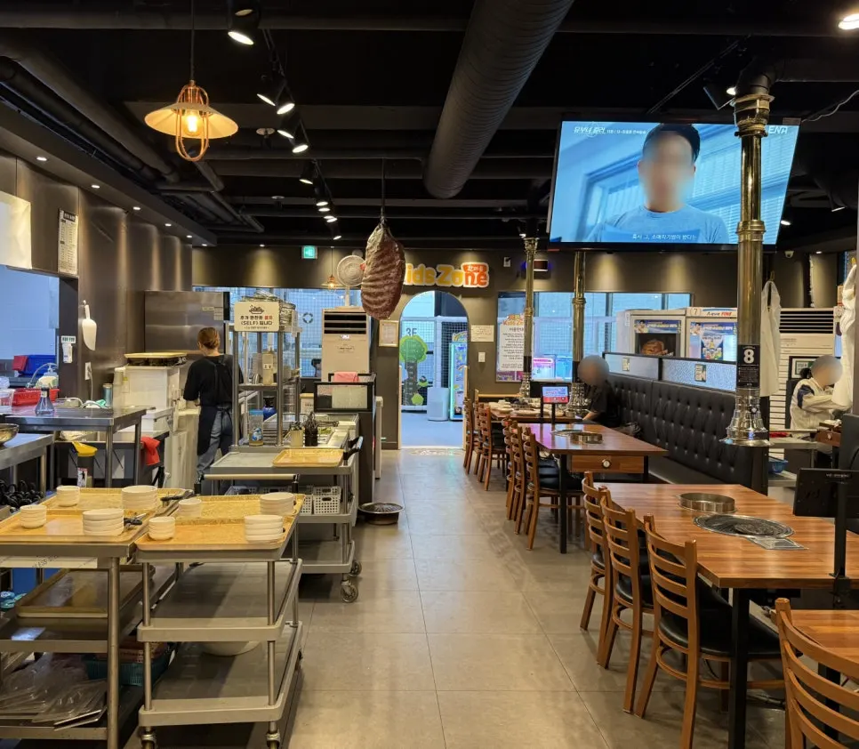 Interior with tables spaced widely apart