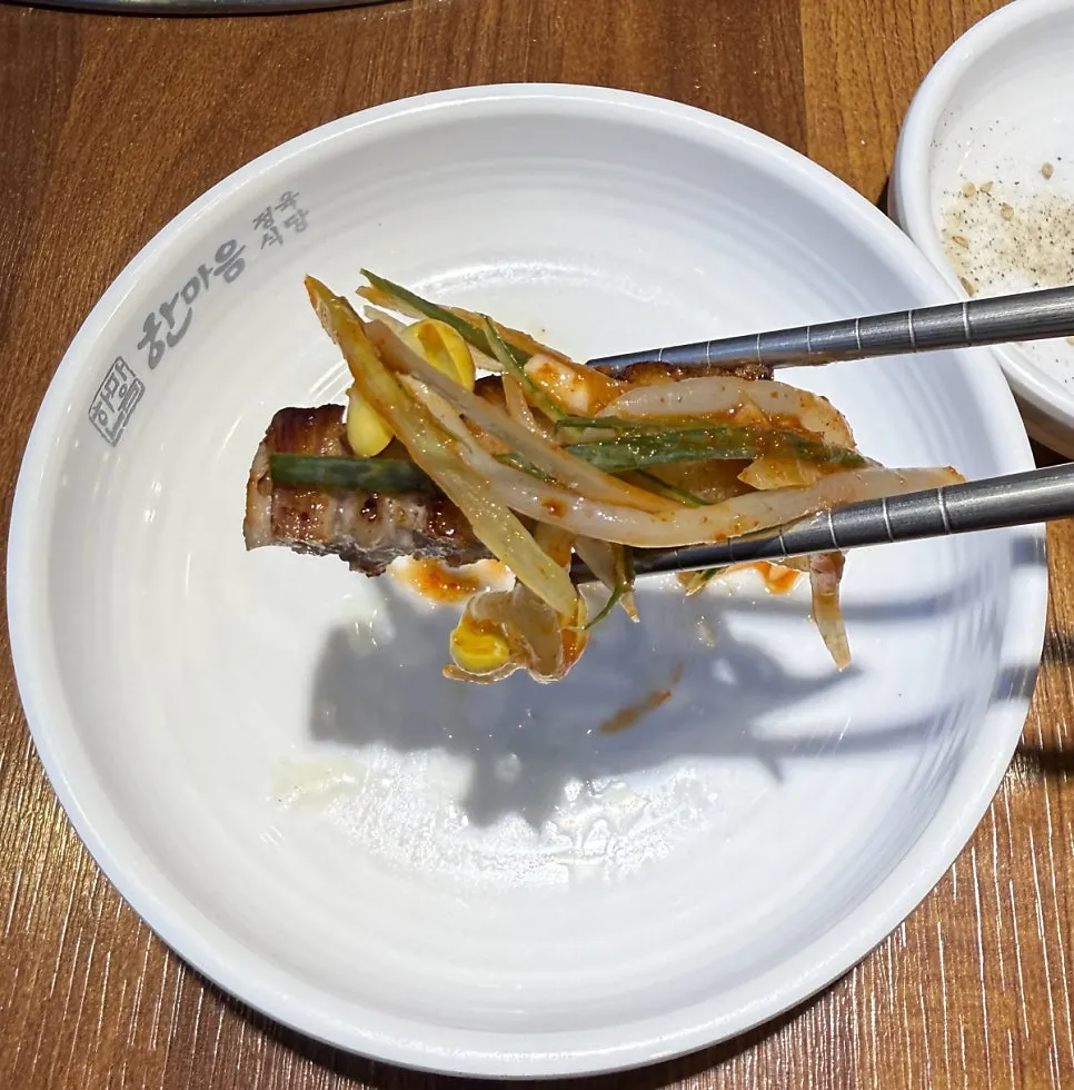 Table spread with meat and doenjang jjigae
