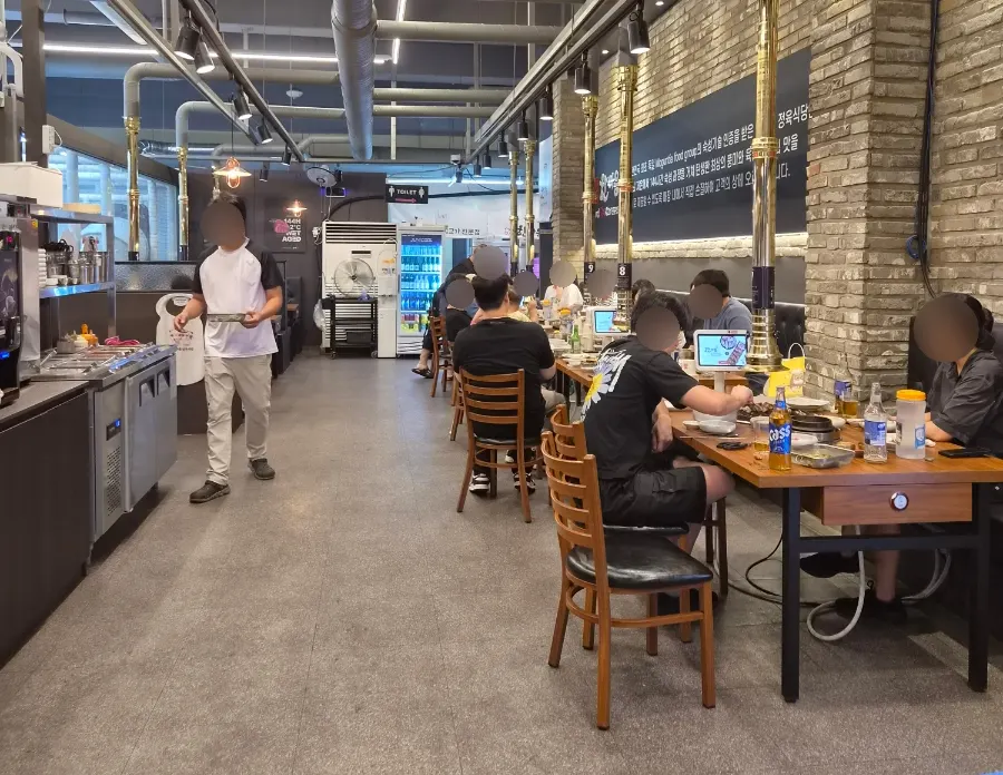 Interior view of the restaurant with generously spaced tables