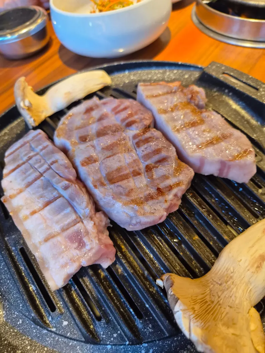 Aged pork belly grilling