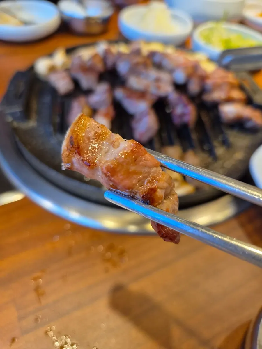 Aged pork neck on the grill
