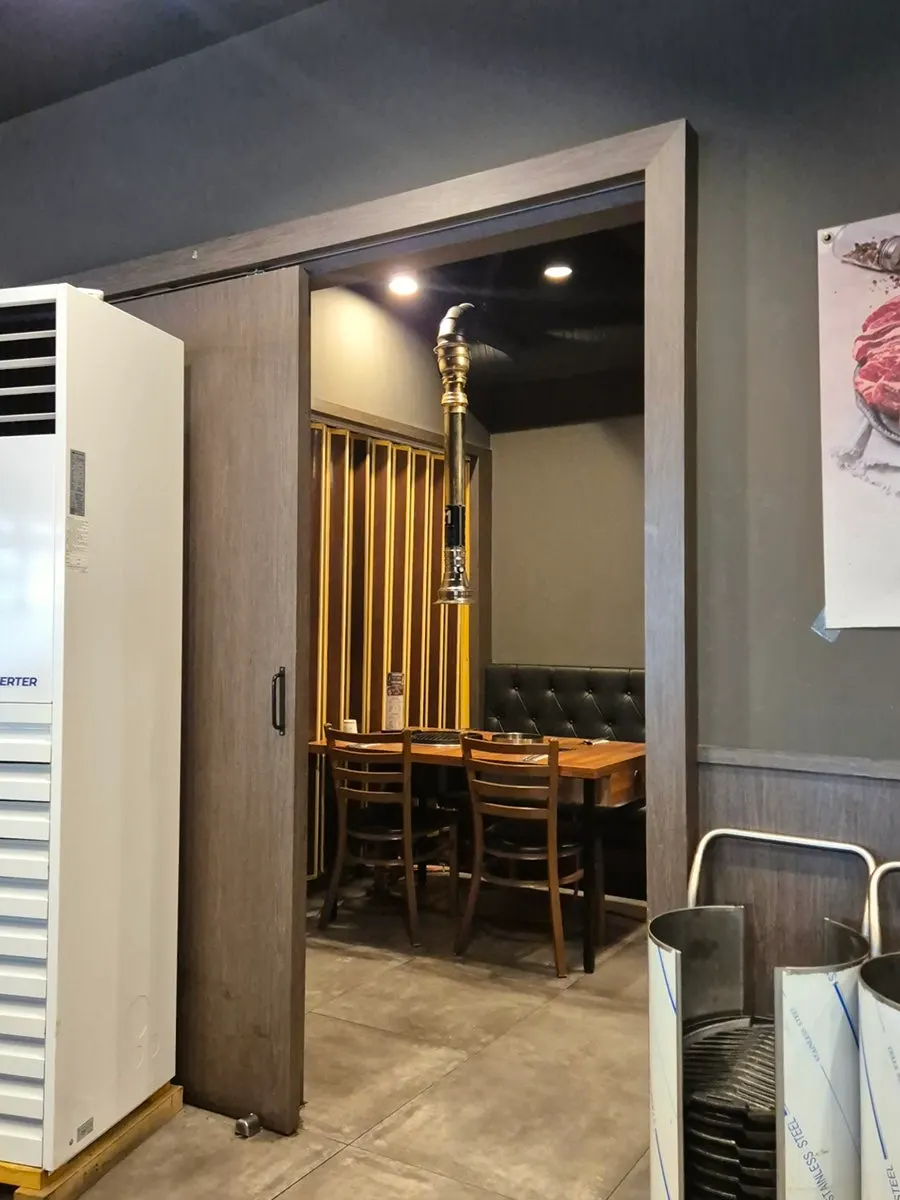 Vertical shot of the restaurant entrance