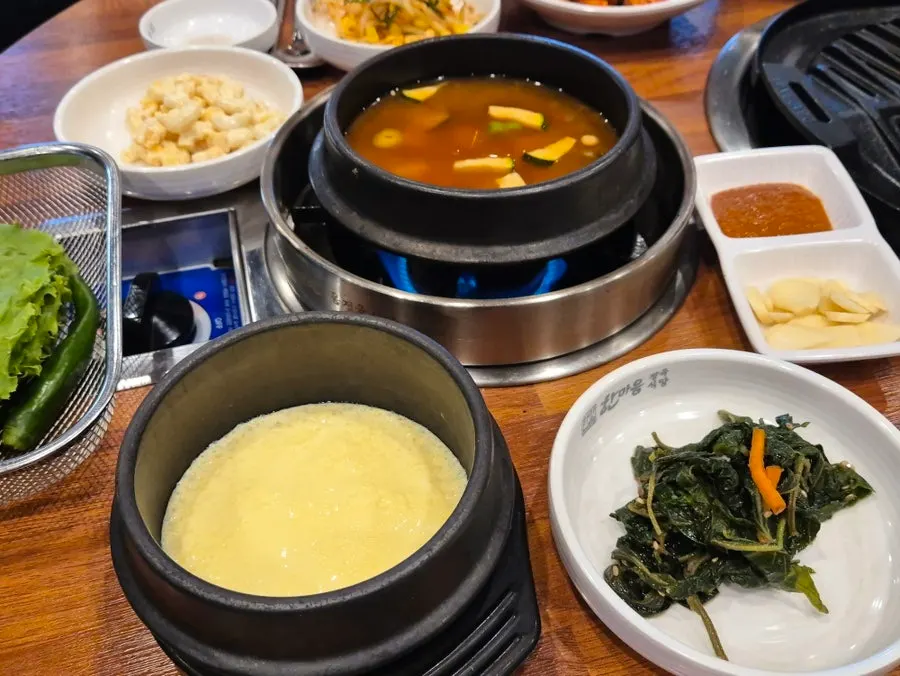 Steamed egg and a full spread of side dishes