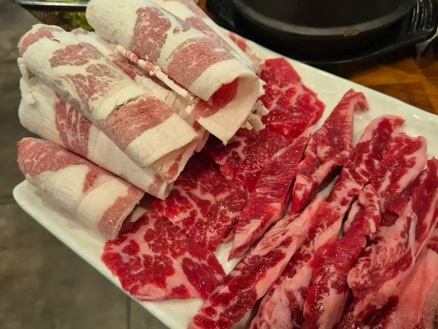 Beef cuts cooking on the grill