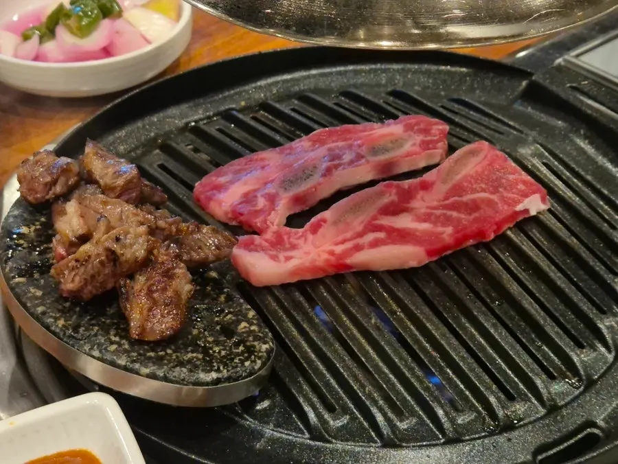 A meal scene with meat and side dishes