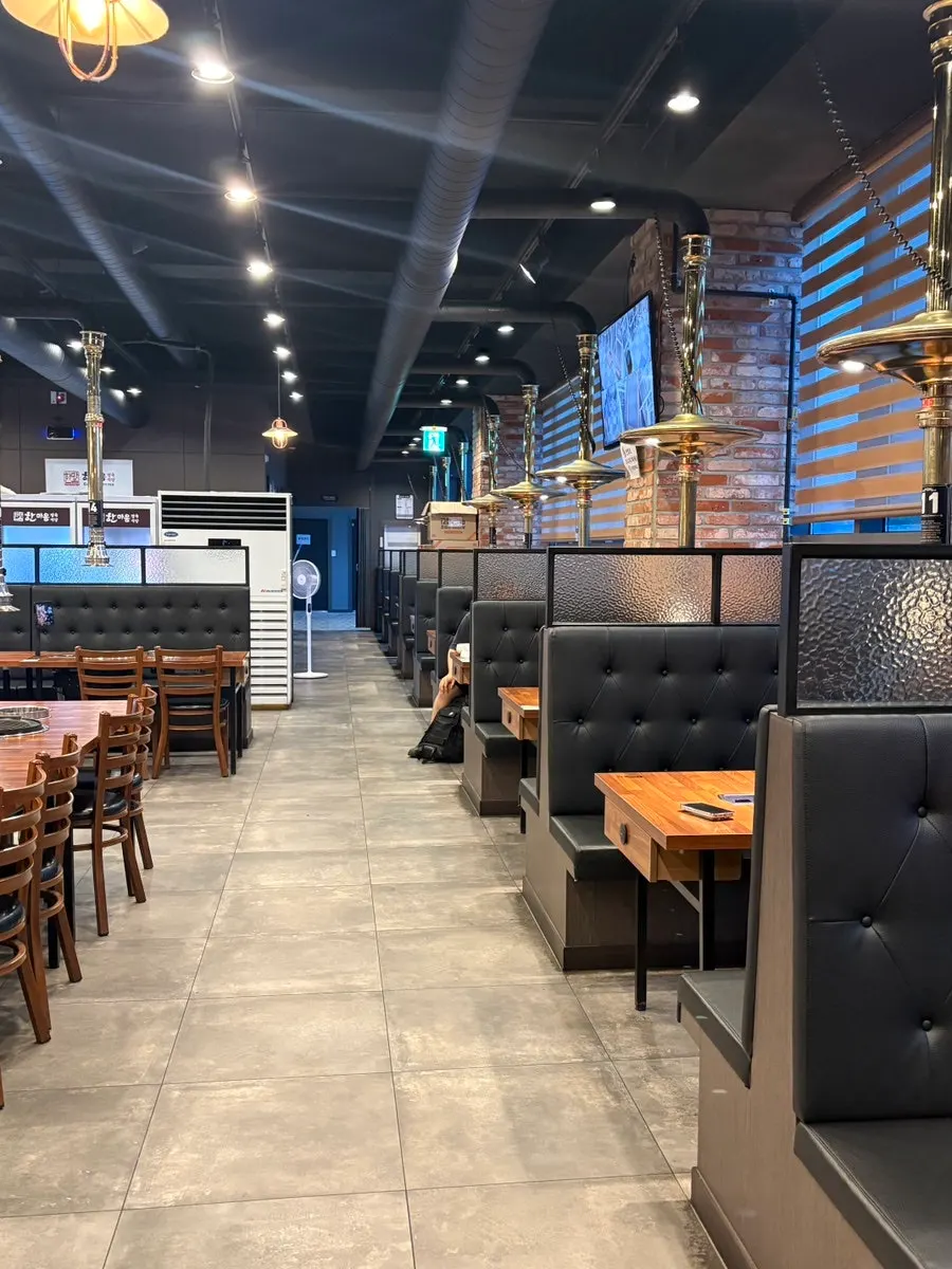 Spaciously arranged tables in the BBQ restaurant dining hall