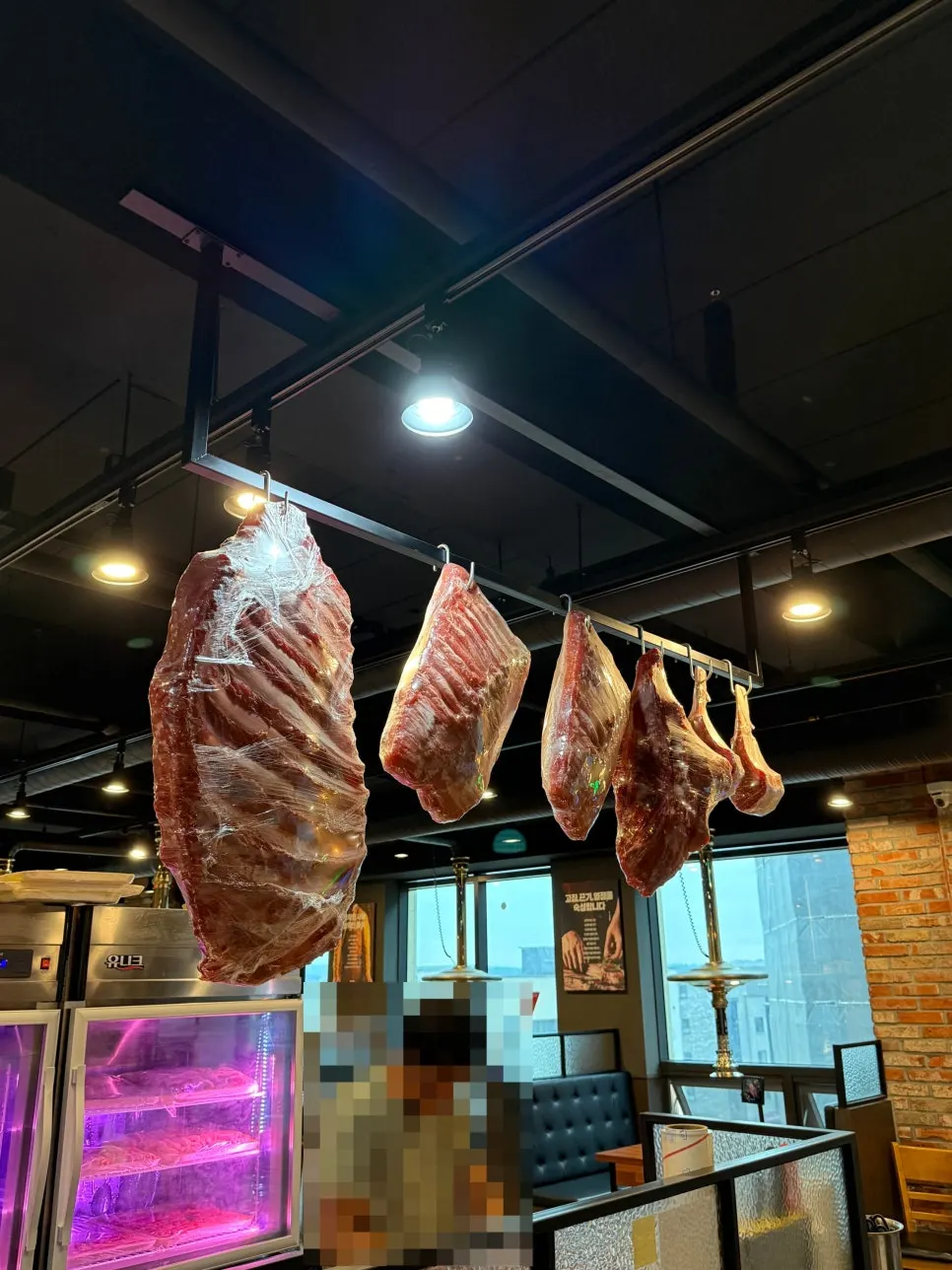 Menu board listing beef and pork options