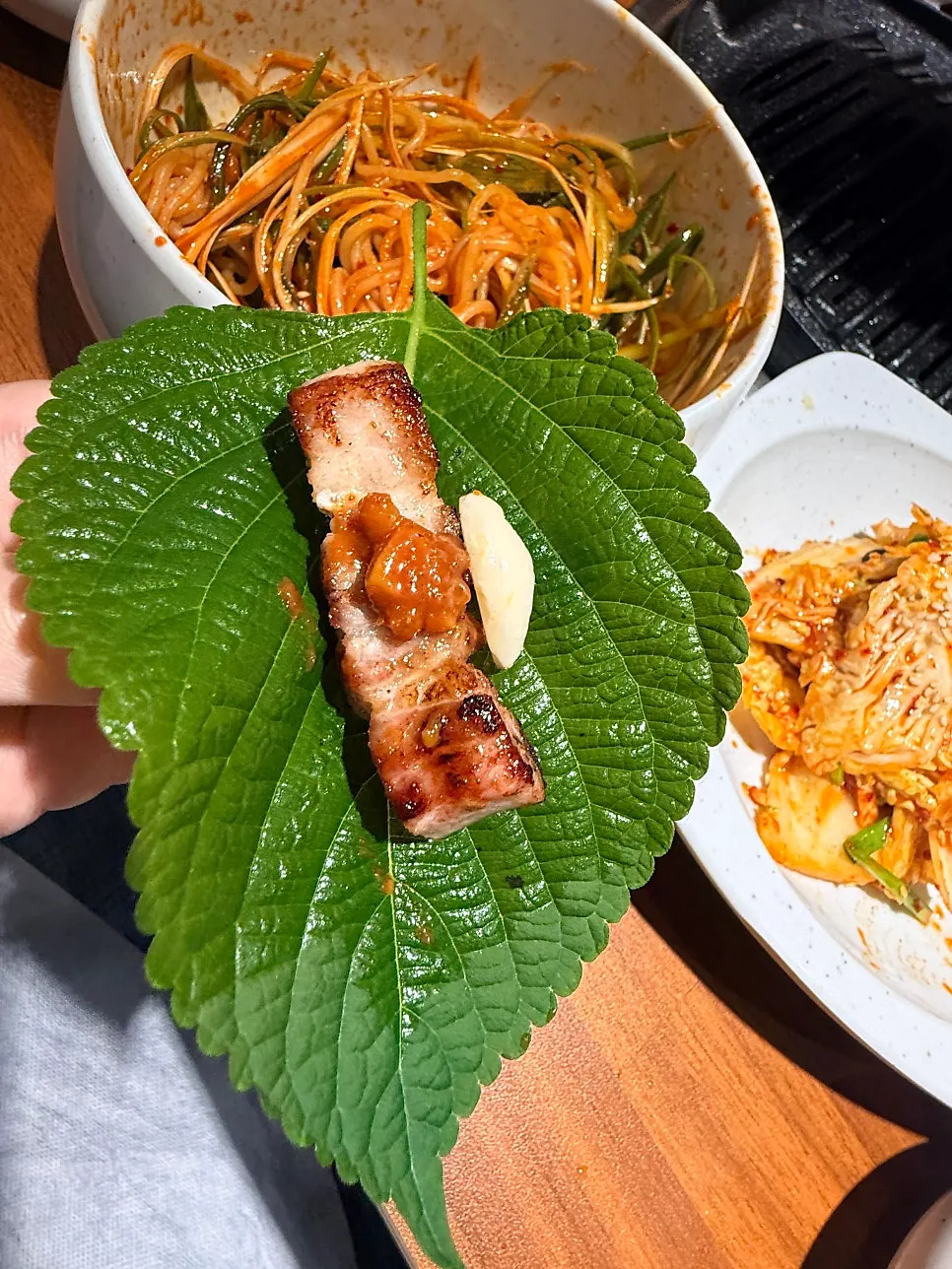 Pork belly wrapped in mountain garlic leaves