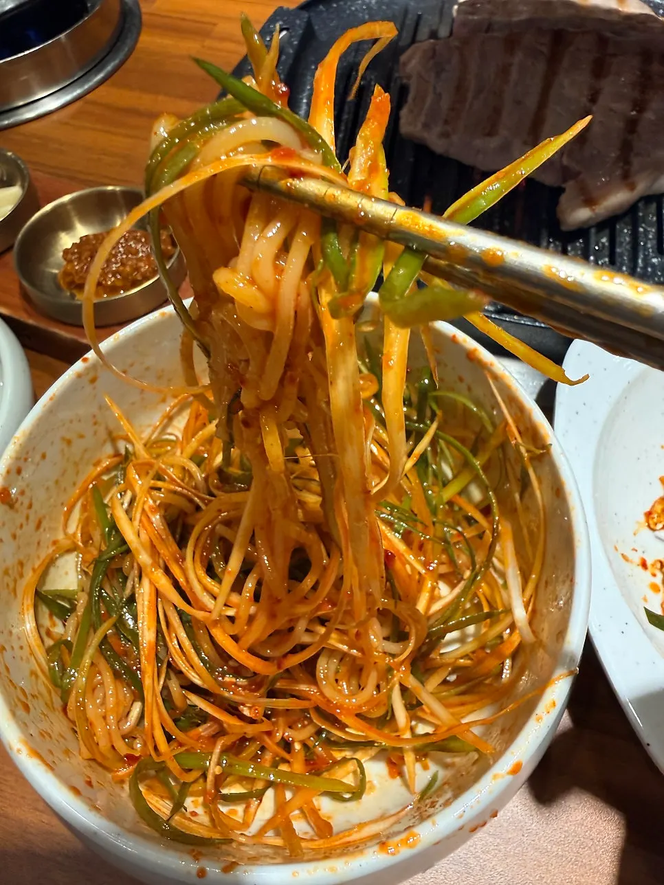 Green onion salad mixed with jjolmyeon noodles