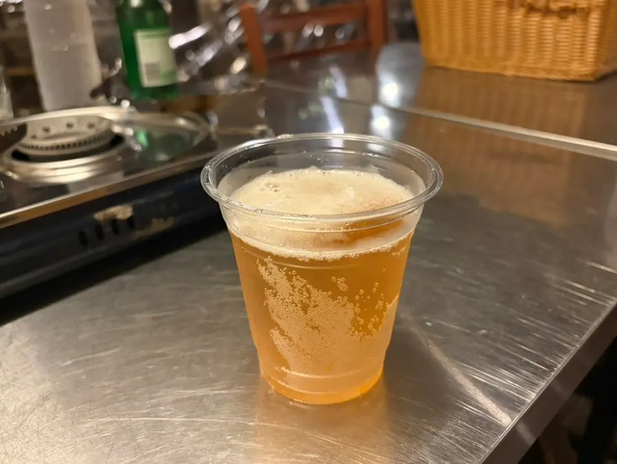 Sign for ₩4,000 unlimited draft beer with a beer glass