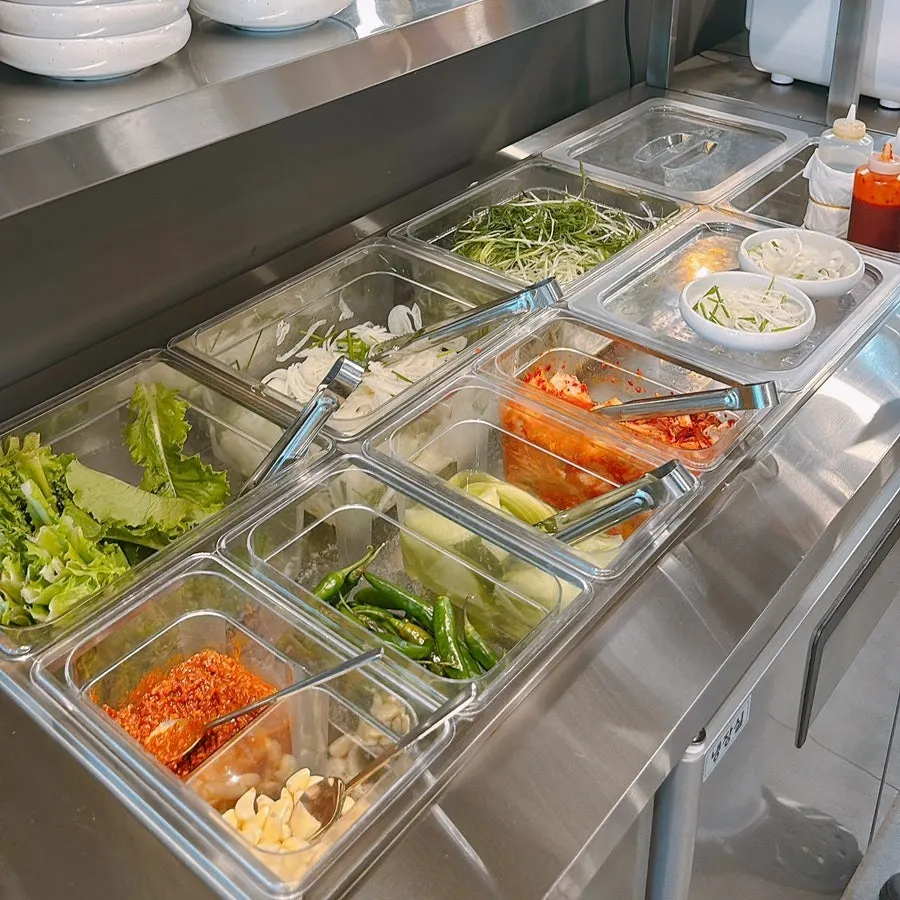 Fresh lettuce and wrap vegetables at the self-serve bar